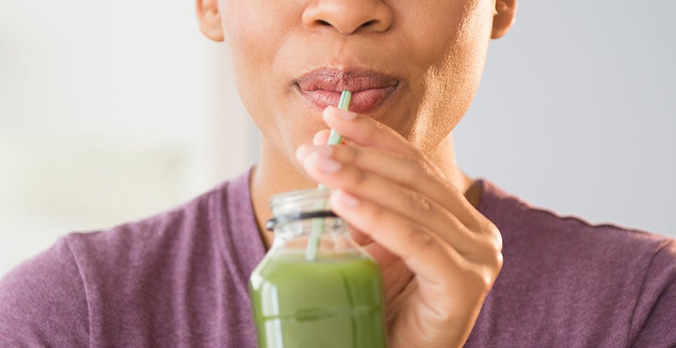 Woman Drinking Smoothie Woman Drinking Smoothie