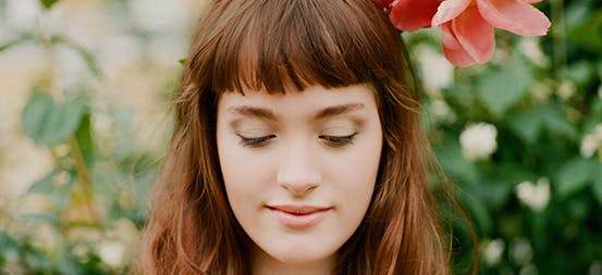 Woman with Flowers in Hair Woman with Flowers in Hair