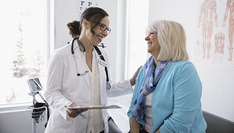 Doctor and patient discussing dry mouth causes Doctor and patient discussing dry mouth causes