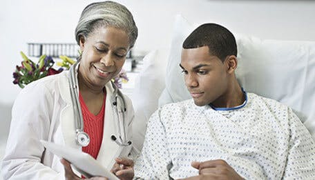 Man talking to a doctor Man talking to a doctor