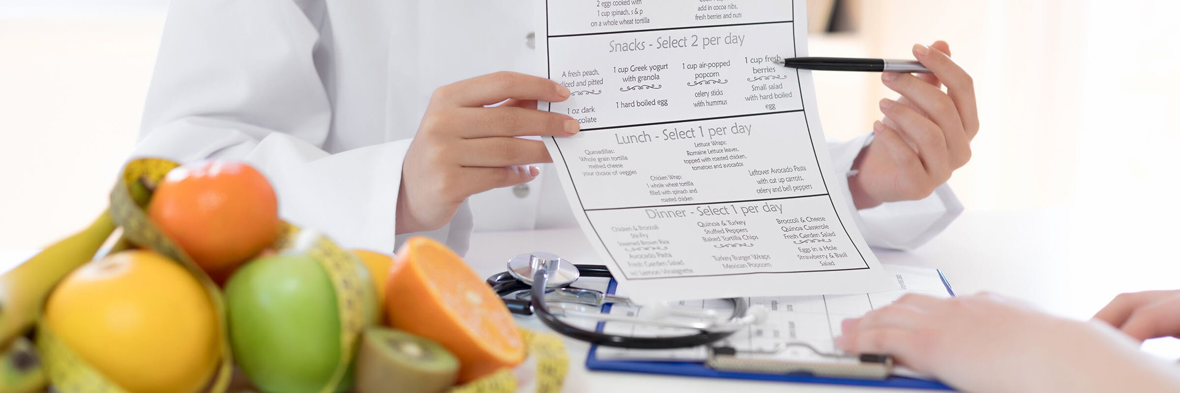 nutritionist with patient