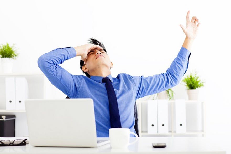 Man_stressing_over_work Man_stressing_over_work