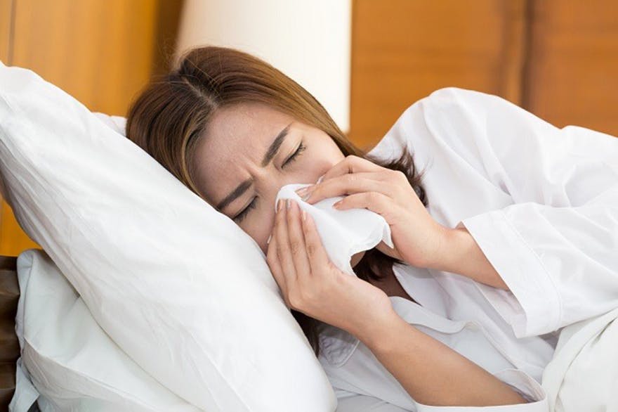 Woman_sneezing Woman_sneezing
