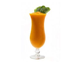 Super Orange Smoothie in a tall glass with mint garnish Super Orange Smoothie in a tall glass with mint garnish
