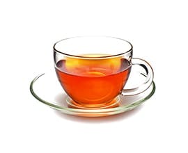 Orange Spice Tea in a clear teacup Orange Spice Tea in a clear teacup