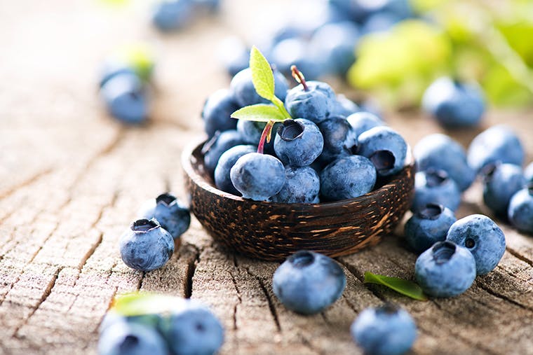 what_are_antioxidants.jpg Small brown bowl filled to the top with freshly picked blueberries