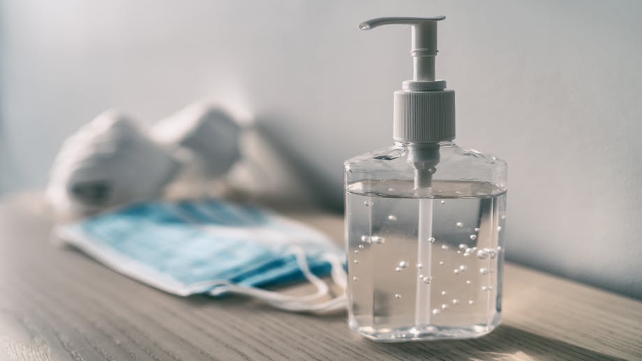 Hand sanitizer bottle on table Hand sanitizer bottle on table