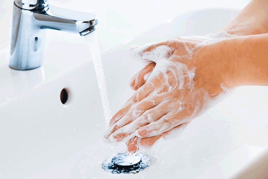 Woman washing her hands Woman washing her hands