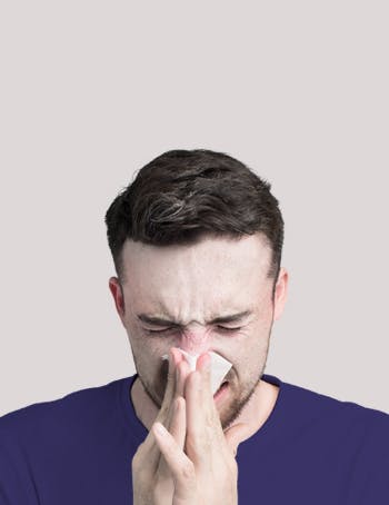 Nasal Congestion | Man blowing his nose Nasal Congestion | Man blowing his nose