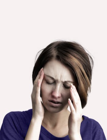 Headache | Woman experiencing a headache Headache | Woman experiencing a headache