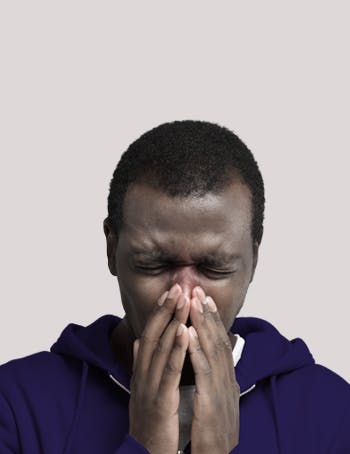 Sinus Congestion | Man blowing nose Sinus Congestion | Man blowing nose