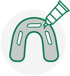 applying dental adhesive cream icon