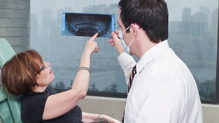 Dentista com paciente