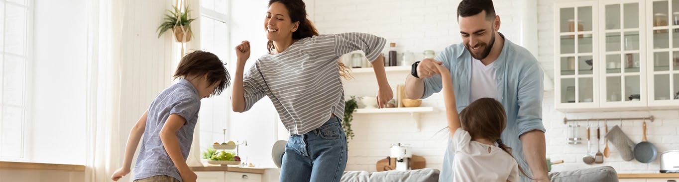 A family dancing at home A family dancing at home