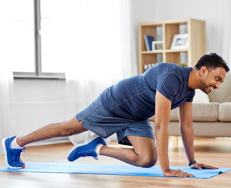a man working out at home a man working out at home