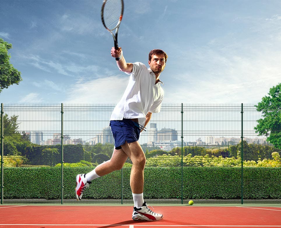 A man playing tennis A man playing tennis