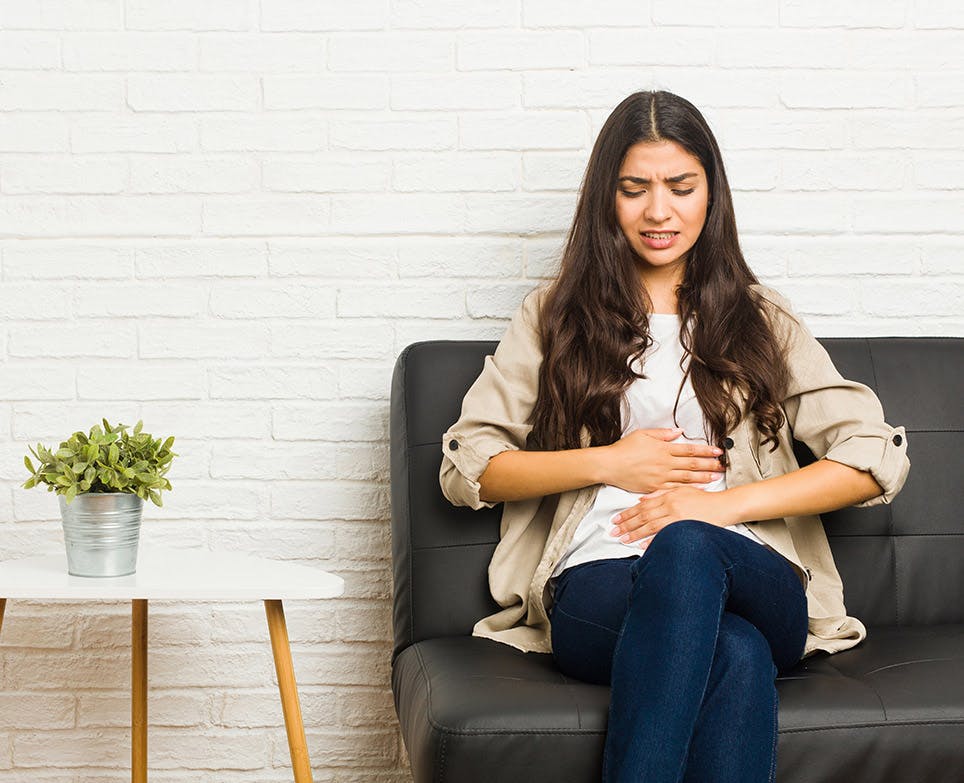 A woman suffering from menstrual pain A woman suffering from menstrual pain