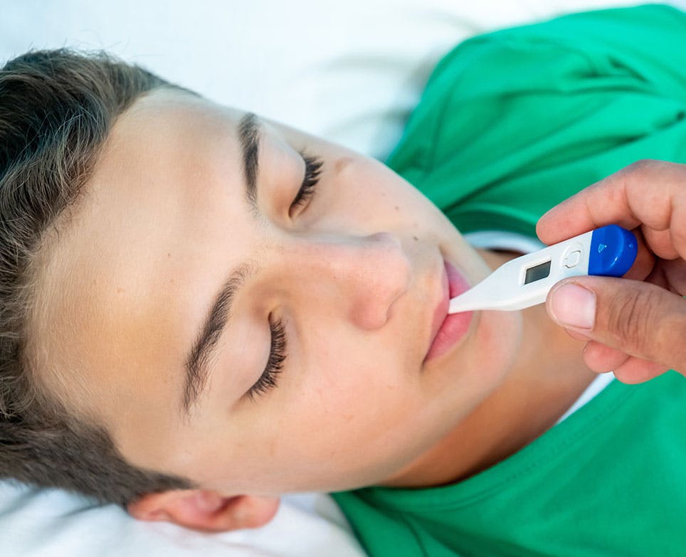 A little boy with a fever A little boy with a fever