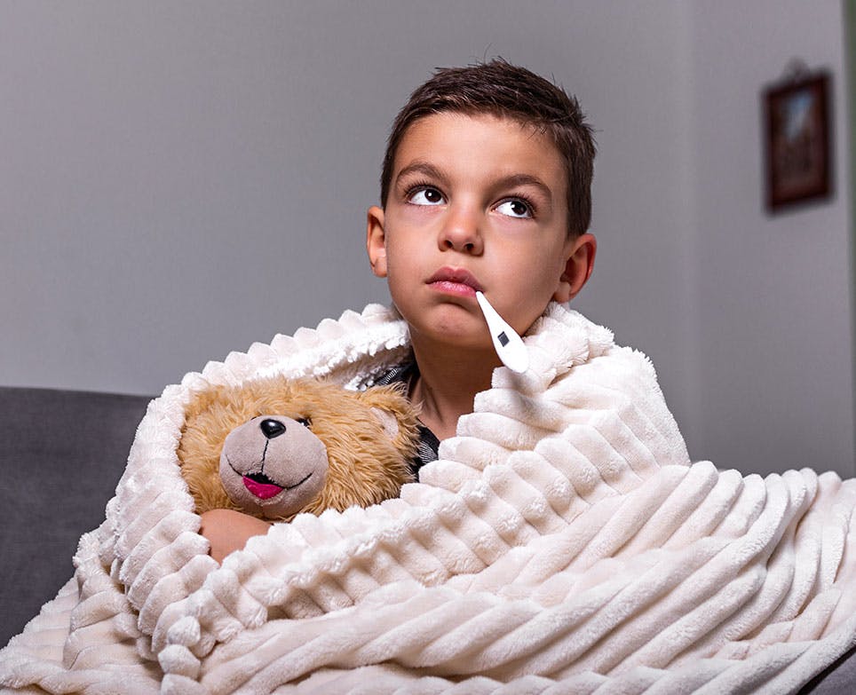A little boy with a fever A little boy with a fever