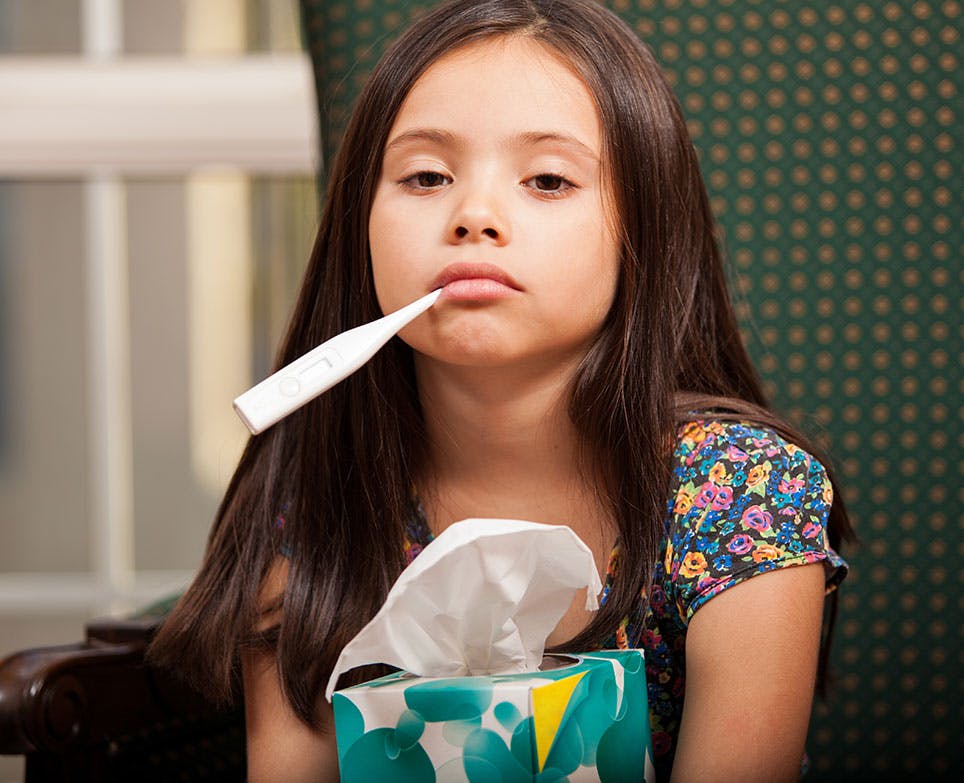 A little girl with a fever A little girl with a fever