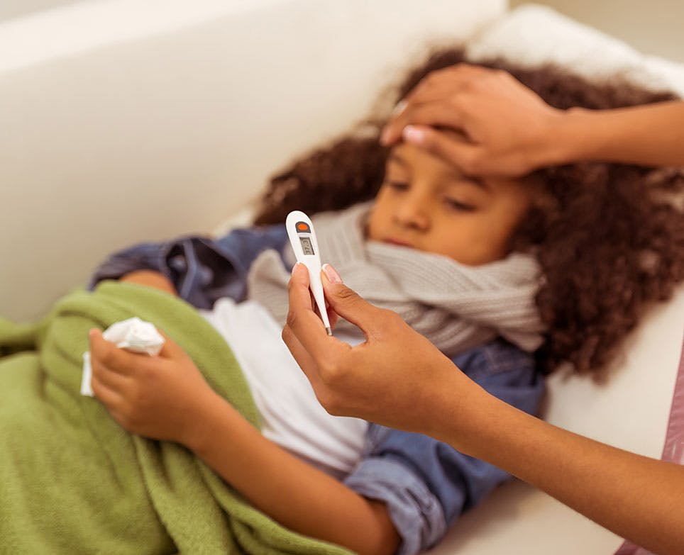A little girl with a fever A little girl with a fever
