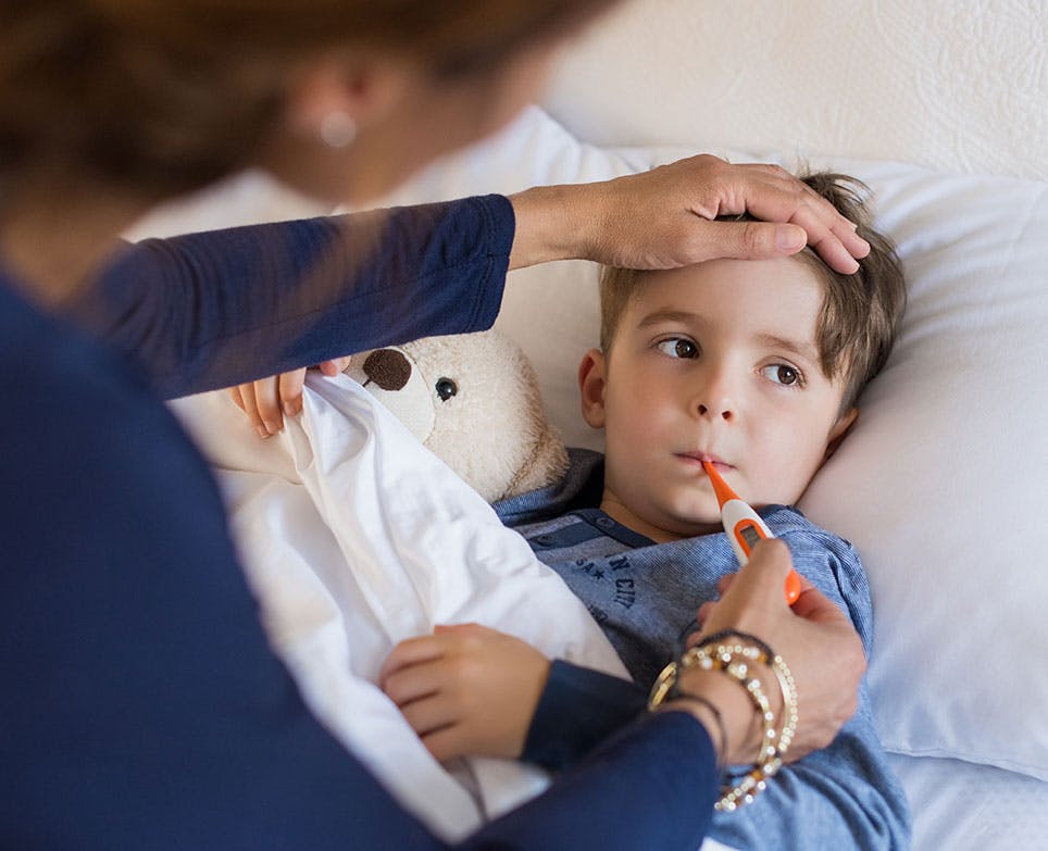A little boy with a fever A little boy with a fever