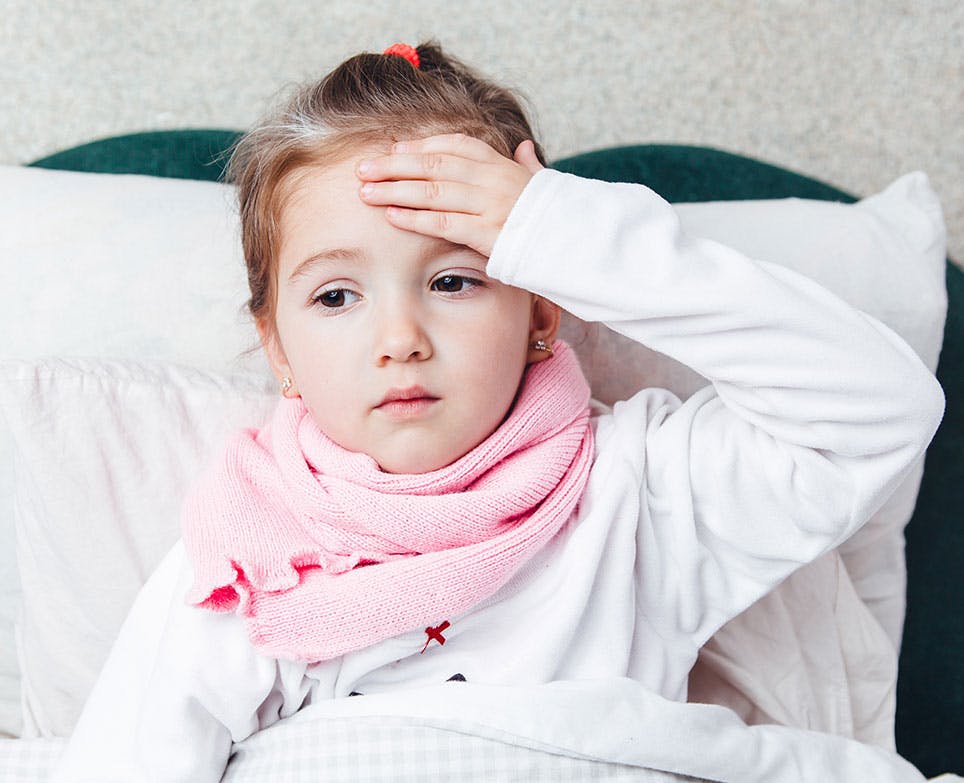 A little girl with a fever A little girl with a fever