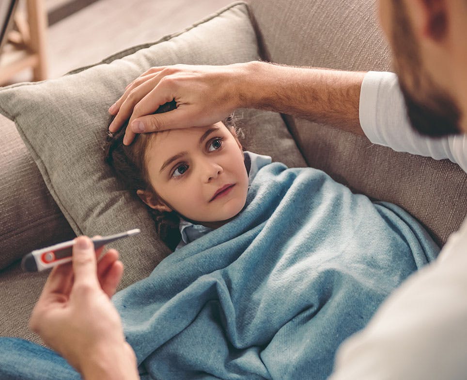 A little boy with a fever A little boy with a fever