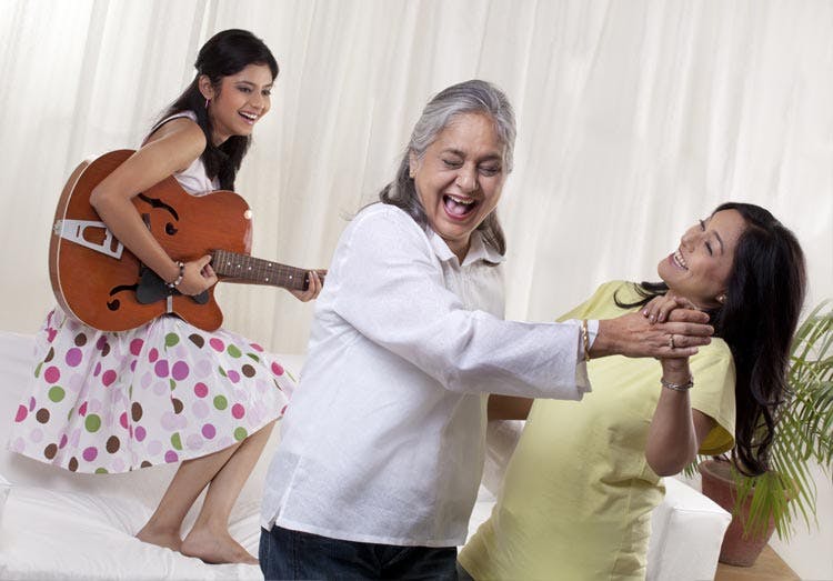 Mother Dancing With Her Daughters In A Field Mother Dancing With Her Daughters In A Field
