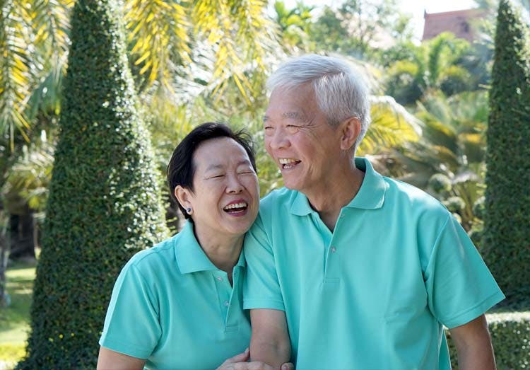 Senior Couple Laughing Together Senior Couple Laughing Together
