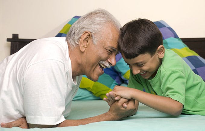 Grandfather playing with grandson Grandfather playing with grandson