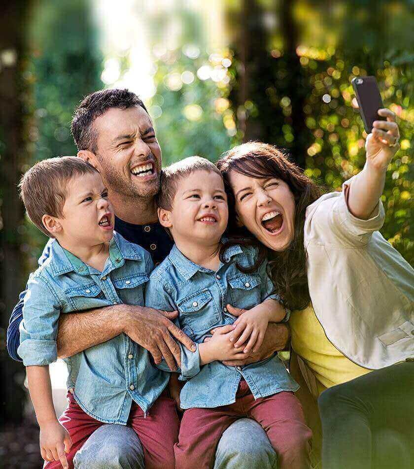 Parents With Children Taking Selfie Parents With Children Taking Selfie