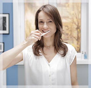 Woman Brushing Teeth Woman Brushing Teeth