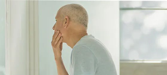 How to remove dentures safely header image man with child