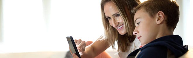 What type of denture adhesive is best for you header image woman spending time with child