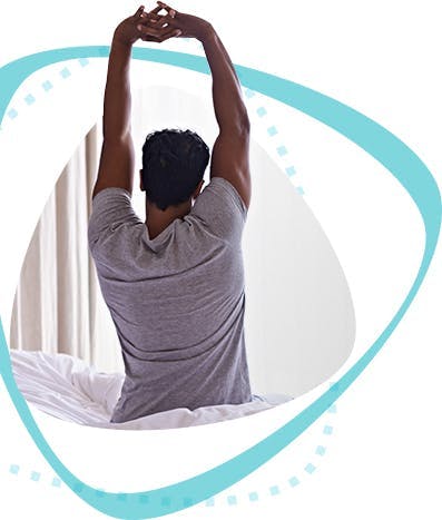 Homme faisant des étirements du matin Homme faisant des étirements du matin