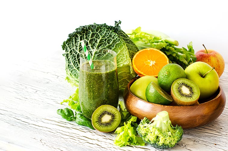 Bowl of Acidic Fruits and Green Smoothie Bowl of Acidic Fruits and Green Smoothie