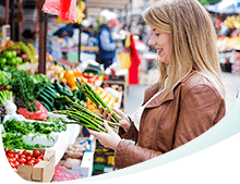 Woman with a White Smile Picking Vegetables Woman with a White Smile Picking Vegetables