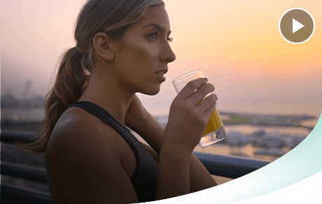 Lilly Sabri Holding A Glass Of Juice and Starting the Day Strong Lilly Sabri Holding A Glass Of Juice and Starting the Day Strong