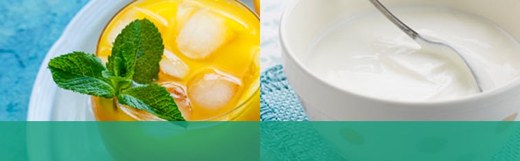 Un verre de jus d'orange acide et un bol de yogourt. Un verre de jus d'orange acide et un bol de yogourt.