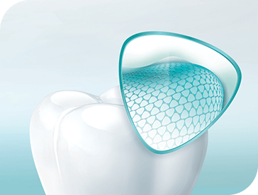 Click here to learn more about Sensodyne Pronamel Close up of a tooth showing part of the surface highly magnified