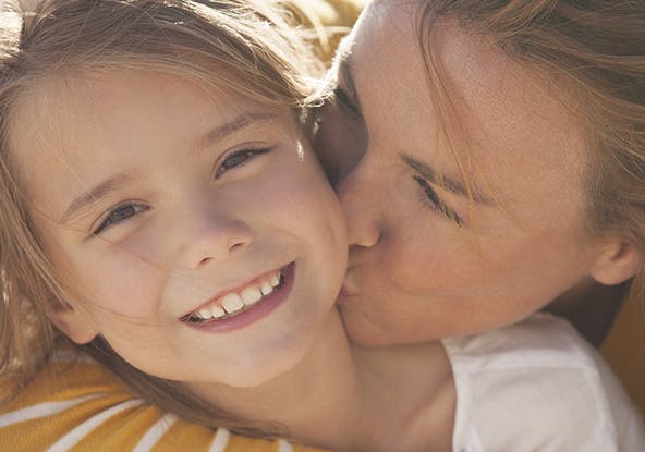 Mother kissing daughter Mother kissing daughter