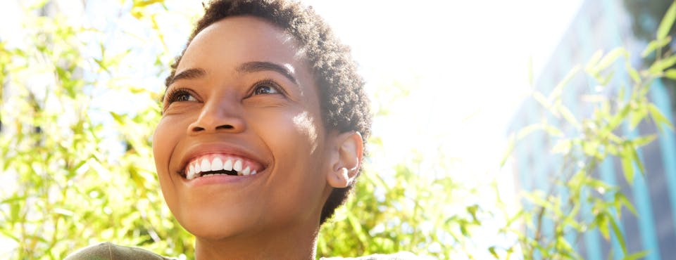 Young healthy woman smiling outdoors Young healthy woman smiling outdoors