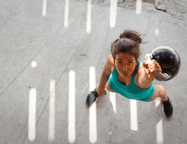 Woman lifting weight Woman lifting weight