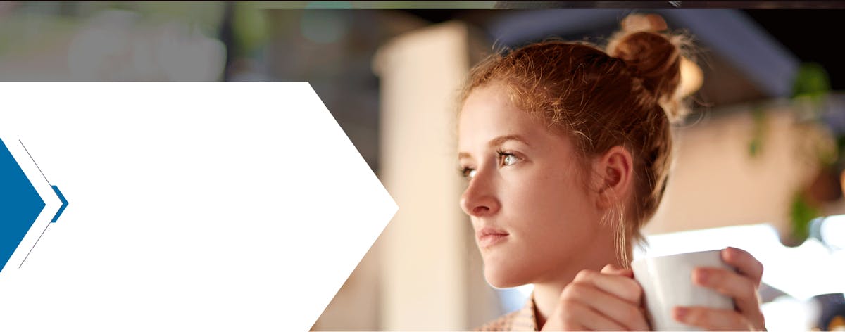 Woman drinking coffee and looking off into the distance Woman drinking coffee and looking off into the distance