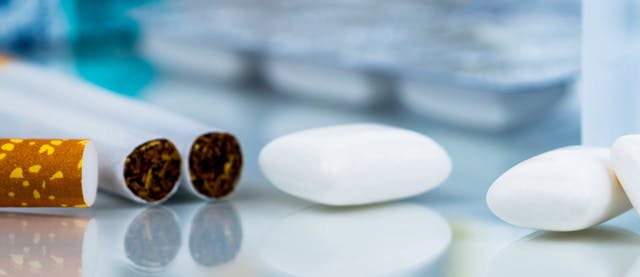 Pack of nicotine gum and products to quit smoking Pack of nicotine gum and products to quit smoking